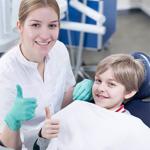 Dentist and Child — Dental Care in QLD