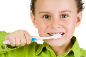 Kid Brushing Teeth — Dental Care in QLD
